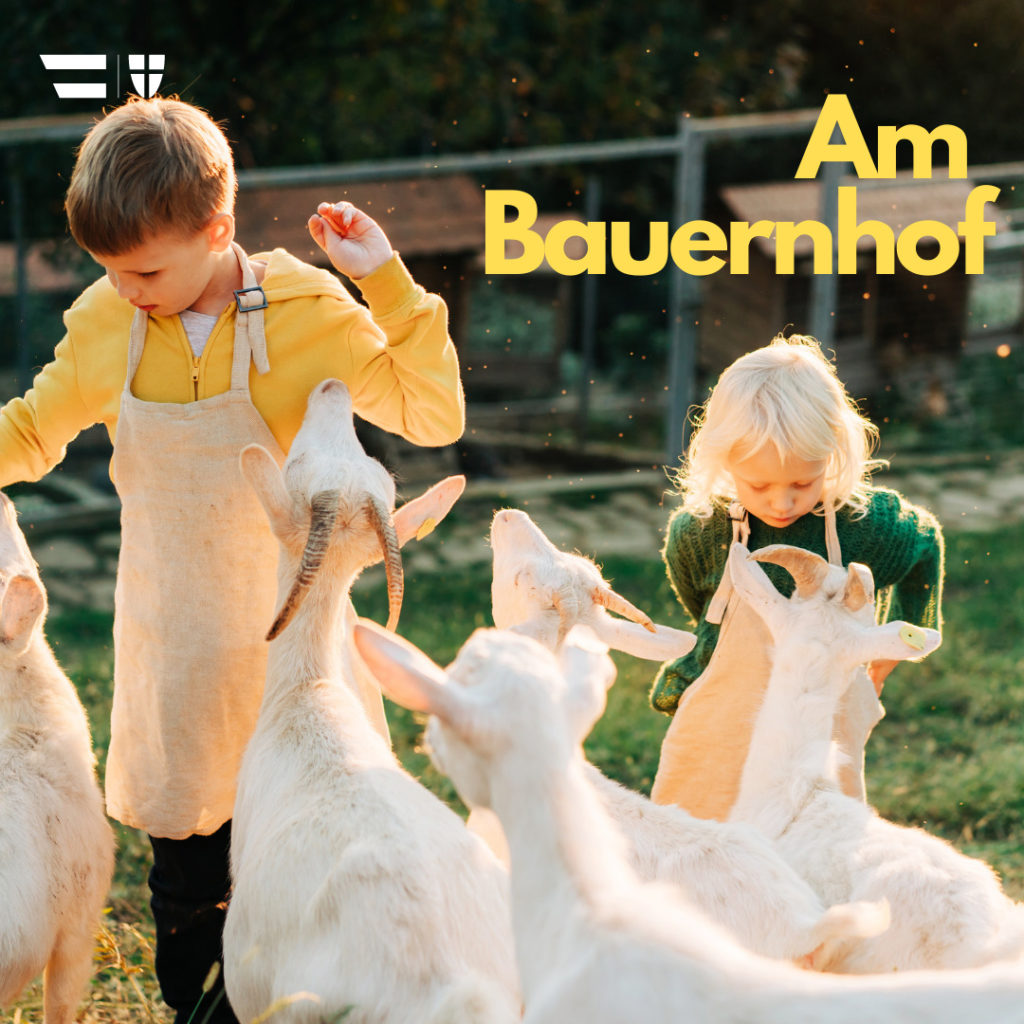 Titel: Am Bauernhof Bild: Kinder spielen mit Ziegen